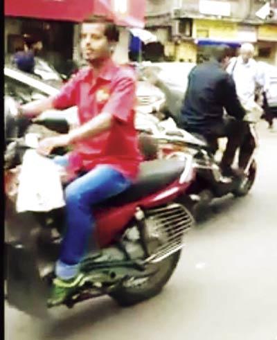 Salim Shaikh on his bike, from a screen grab taken from the video the woman’s husband shot