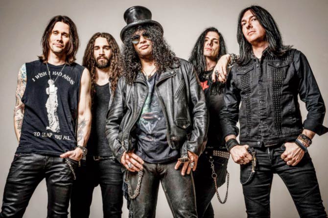 Slash (in centre wearing his signature hat) with the band Myles Kennedy and the Conspirators