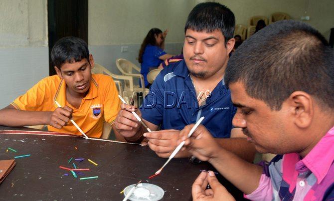 Students engrossed in art and craft at Mann