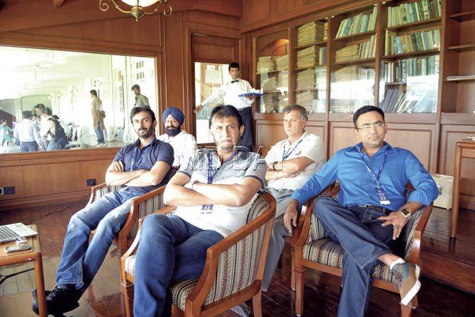 Indian cricket selectors (from left) Vikram Rathour,  Rajinder Singh Hans, Sandeep Patil (chairman), Roger Binny and Syed Saba Karim watch an India A vs West Indies game at the Brabourne Stadium last year. Pic/Atul Kamble