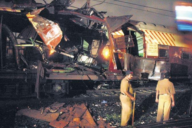 Mangled remains of the first class compartment of a Virar-bound train in which one of the blasts occurred after the local left Mahim station. 188 people died after seven RDX bombs exploded in the first class coaches of seven local trains on July 11, 2006. File pic