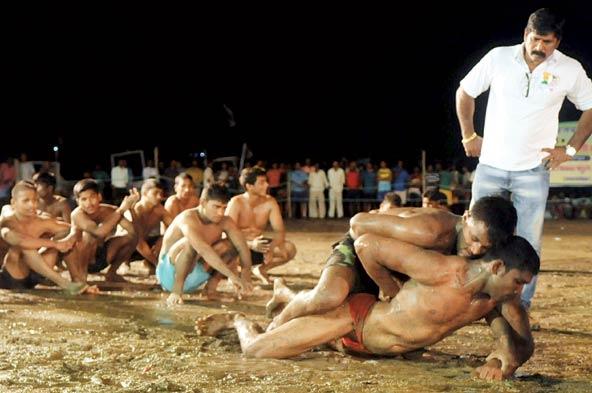 Photos: Wrestling competition at Madh Island beach