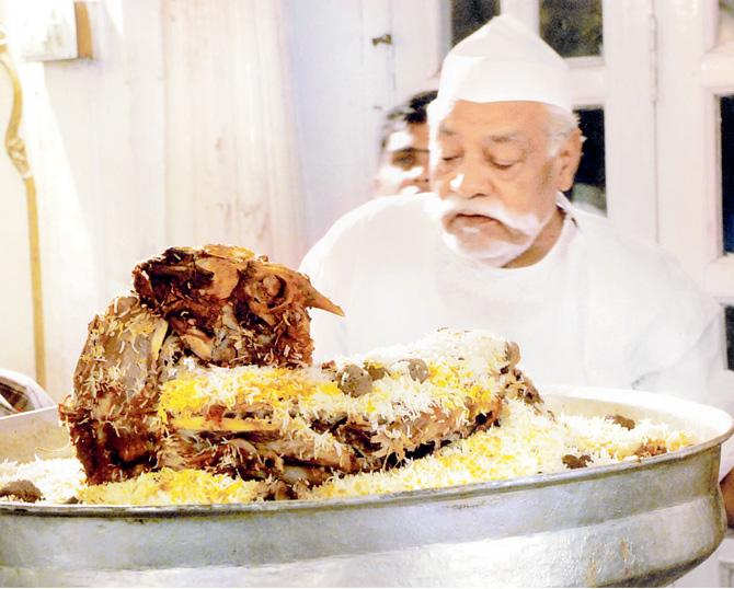 Chef Imtiaz Qureshi serving the Musallam Bakra Biryani