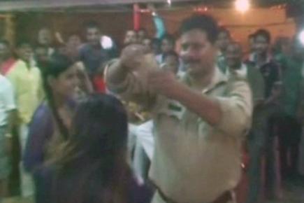 Caught on camera: On duty cops shake legs with bar dancers