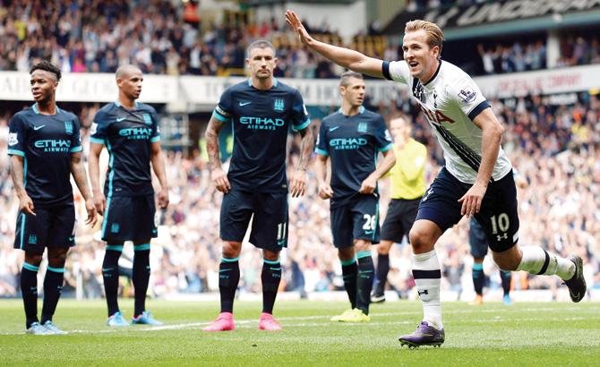 Tottenham Hotspur’s Harry Kane celebrates after scoring their third goal during an EPL match against Manchester City at White Hart Lane on Saturday. Pic/Getty Images