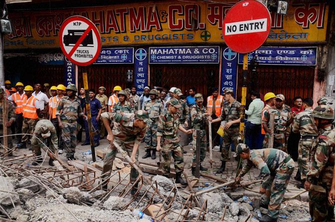Army and NDRF personnel carrying out rescue operations at Vivekananda Road where an under-construction flyover collapsed in Kolkata on Friday