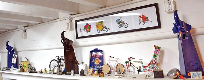 Curios and artworks that dot a shelf at Kulavoor’s studio in Mazagaon