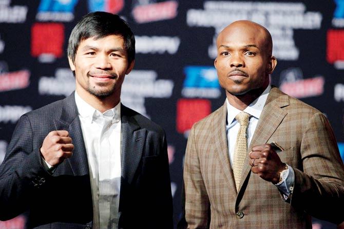 Welterweight boxers Manny Pacquiao (left) and Timothy Bradley Jr at the MGM Grand Hotel & Casino in Las Vegas recently. pic/AFP 