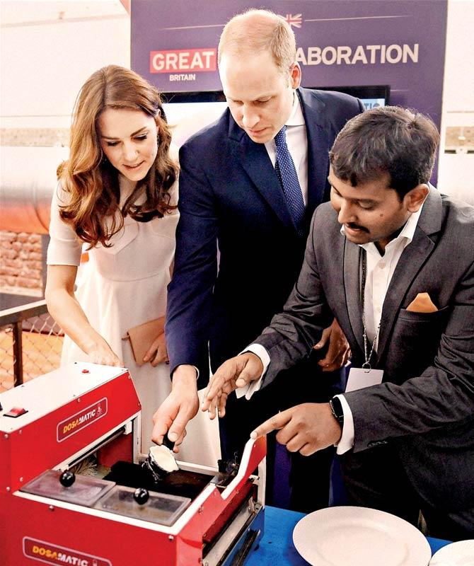 Prince William and Kate Middleton were shown DosaMatic by co-founder Eshwar Vikas. Pics/PTI