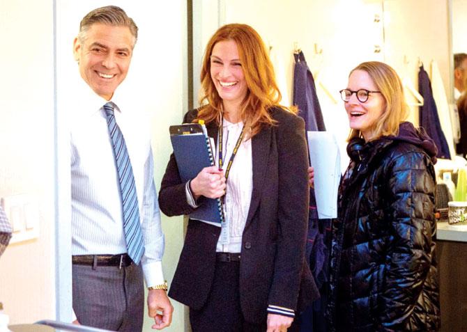George Clooney, Julia Roberts and director Jodie Foster on the set of Hollywood film, Money Monster
