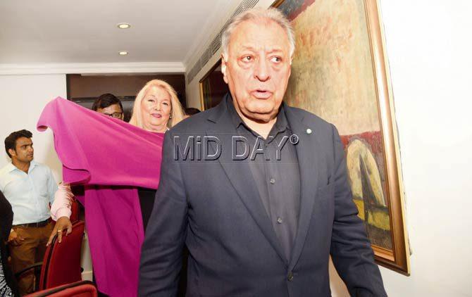 Zubin Mehta and wife Nancy Kovack make their way to a press conference to announce the release of his biography at a Colaba five-star last evening. Pic/Suresh Karkera