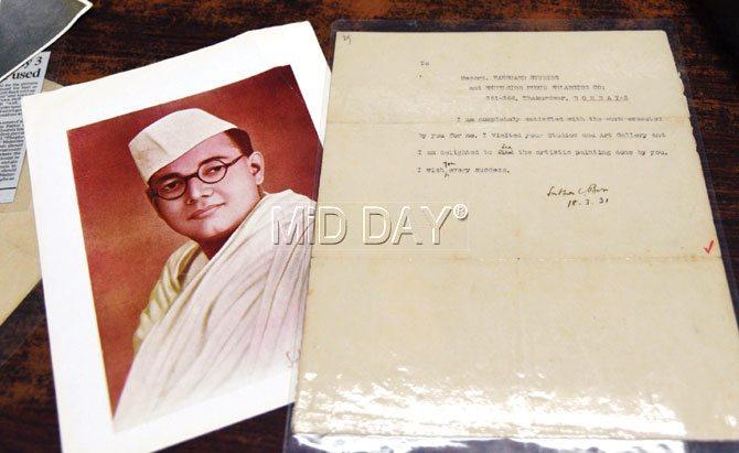 The photograph of Subhash Chandra Bose that was taken at the studio, and a typed letter signed by him, where he expressed his satisfaction with the pictures taken