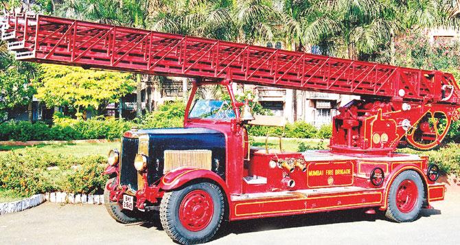 The vintage fire engine is 90 years old