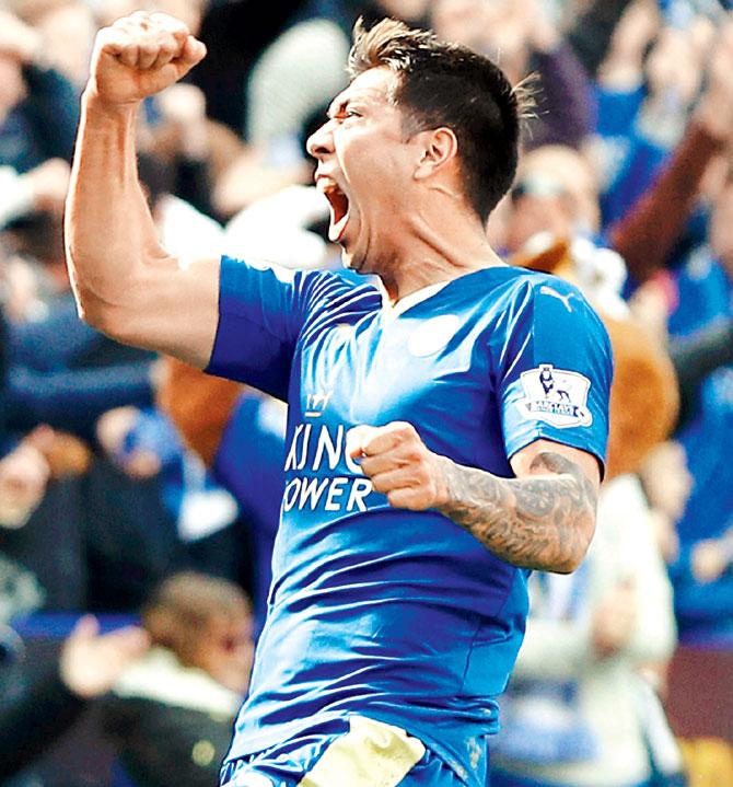 Leicester City striker Leonardo Ulloa celebrates after scoring his team