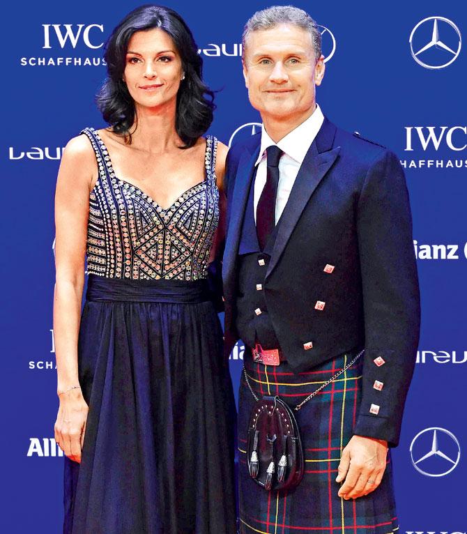 Former British Formula One racer David Coulthard with wife Karen Minier