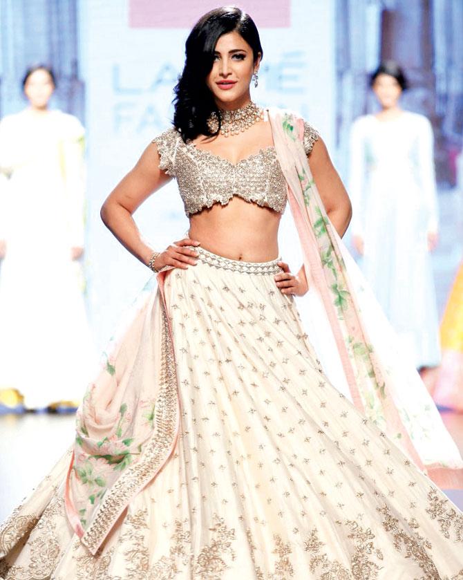 Staying away from the heavy borders used for lehengas, Anushree Reddy created a bejewelled hem to shake things up