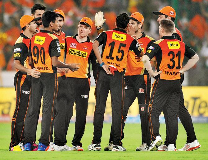 Sunrisers Hyderabad players celebrate the fall of a Kings XI Punjab wicket during the Indian Premier League match at the Rajiv Gandhi International Stadium in Hyderabad on Saturday. Pic/AFP 