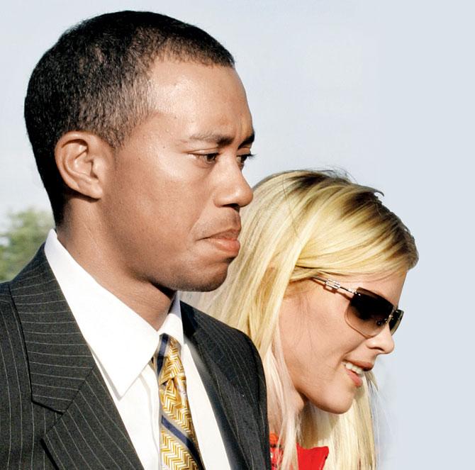 LEFT: Tiger Woods and Elin Nordegren at the opening ceremony of the Ryder Cup at Oakland Hills Country Club in Bloomfield Township on September 16, 2004. PIC/AFP