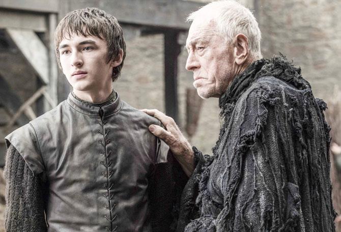 Isaac Hempstead Wright as Bran Stark and Max von Sydow as Three-Eyed Raven in 