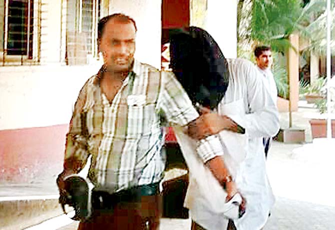 The accused, Anil Ojha, was served the humble pie after the police caught him extorting the pizza company