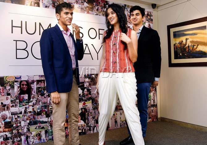 The author of Humans of Bombay, Karishma Mehta, flanked by publishers Karan (to her right) and Arjun at Cymroza Art Gallery, Breach Candy on Friday. Pic/Atul Kamble