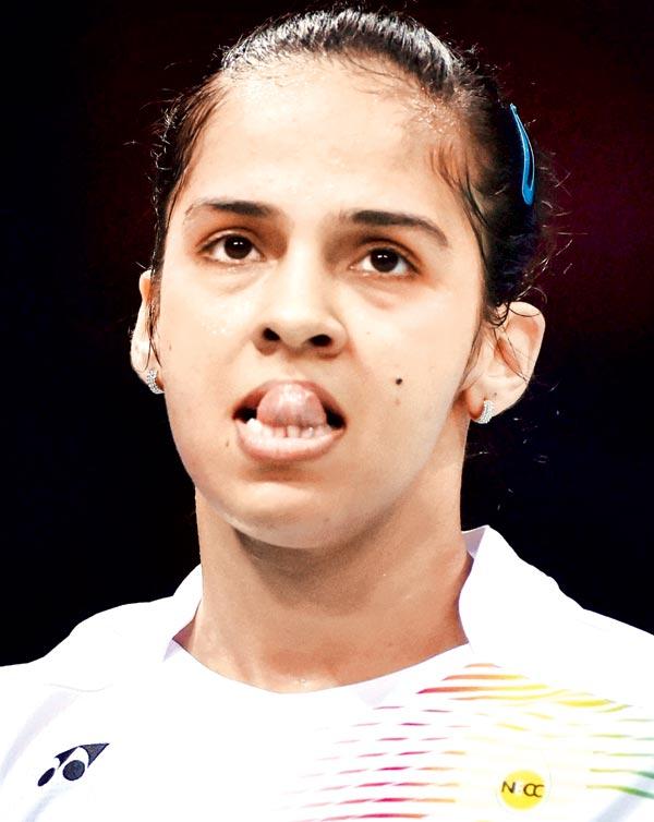 Saina Nehwal reacts after her India Open semis loss to Li Xuerui in New Delhi on Saturday. Pics/PTI