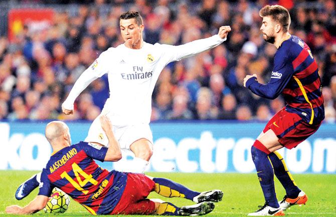 85 minute: Cristiano Ronaldo (centre) shoots to score Real Madrid