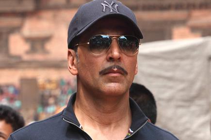 Was Akki detained at Heathrow airport? 