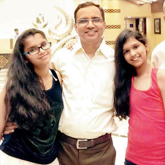 Shah with his daughters