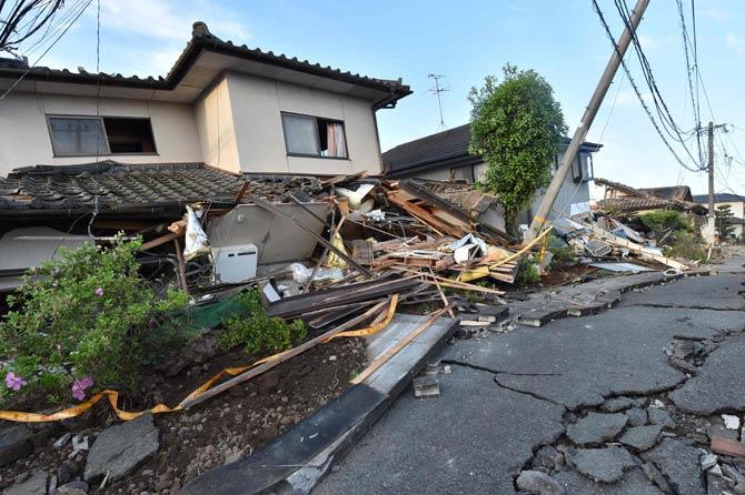 Collapsed houses are seen in Mashiki, Kumamoto prefecture after a powerful earthquake hit southern Japan early April 16. AFP PHOTO