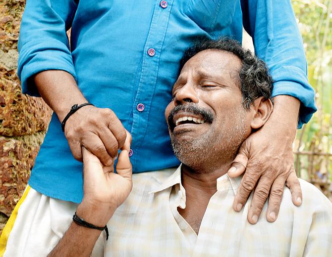 An irreplaceable loss: Ganesh P, father of 20-year-old Vishal, who died in the Sunday’s fire tragedy, breaks down after cremating his son. Pic/PTIAn irreplaceable loss: Ganesh P, father of 20-year-old Vishal, who died in the Sunday’s fire tragedy, breaks down after cremating his son. Pic/PTI