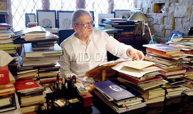 Gulzar in his study with a collection of books. His collection has for many years included the complete works of Tagore. Pic/Nimesh Dave