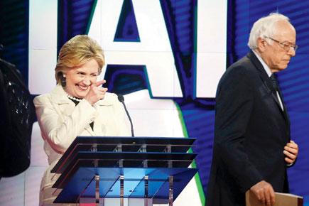 Bernie Sanders fans shower Hillary Clinton car with $1 bills