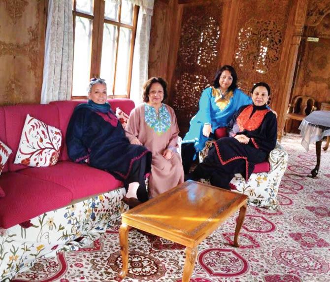 Sunita Saxena with her friends and family in the houseboat
