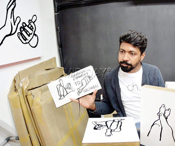 Kulavoor displays the sketch of a sleeping man he drew during his train journey from Chennai to Mumbai. Pics/Sayed Sameer Abedi