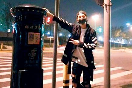 Fans make beeline for photos next to post box touched by K-pop star