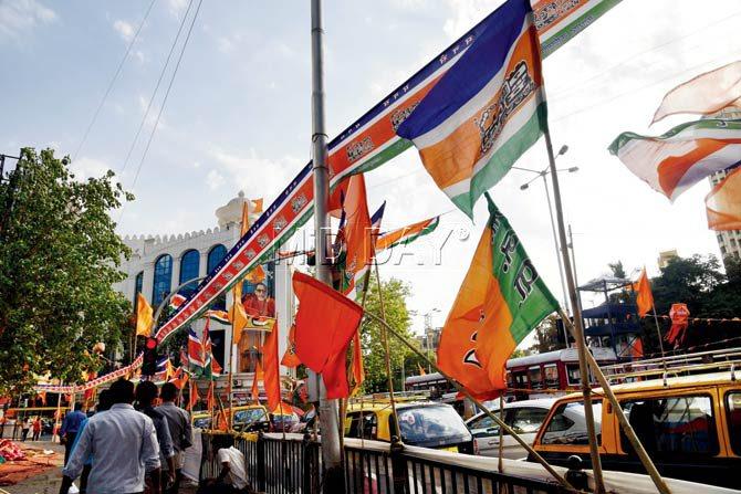 Flags of Shiv Sena, BJP and MNS flutter near Shiv Sena Bhavan in Dadar, yesterday. Pic/Atul Kamble