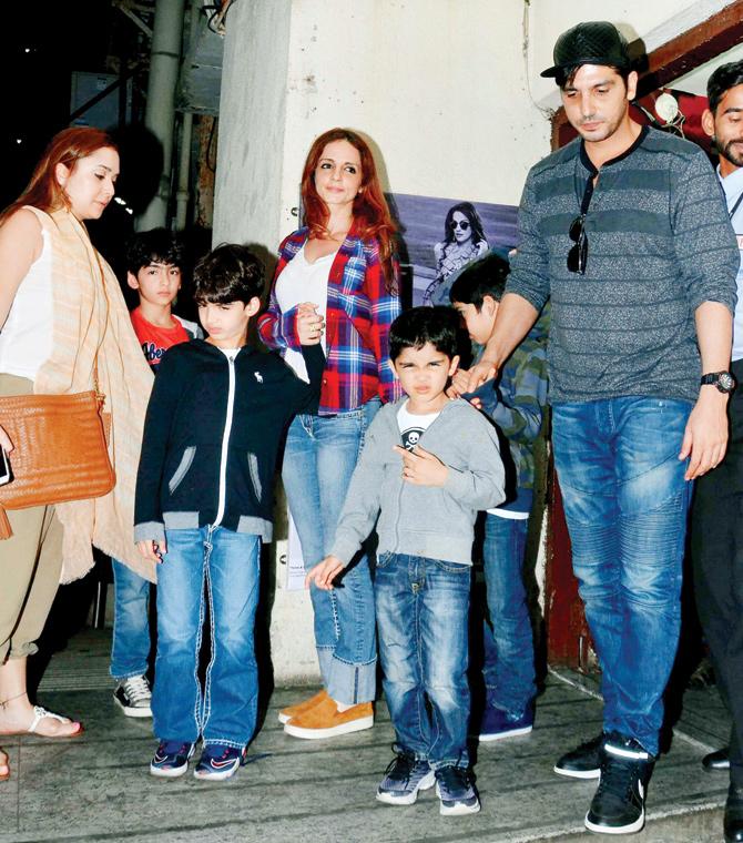Malaika Parekh and Zayed Khan, along with Sussanne Khan (centre), took the kids of the family for the flick about a boy in the jungle.  Pics/ Yogen Shah