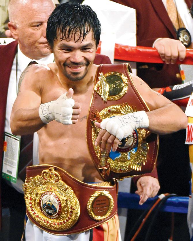 Philippines Manny Pacquiao celebrates after beating USA