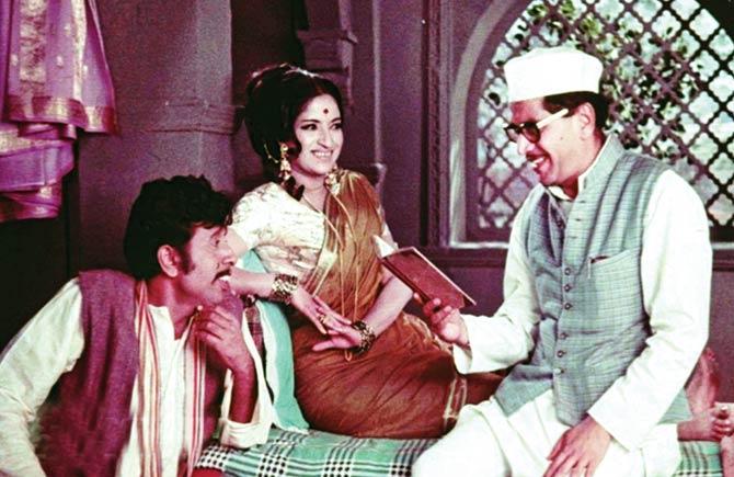 Nilu Phule, Sandhya and Shriram Lagoo in a still from the film