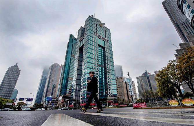 The building (centre) where the Panama-based law firm Mossack Fonseca has an office in Shanghai. Pic/AFP
