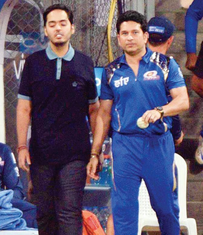 Mumbai Indians mentor Sachin Tendulkar and Anant Ambani, son of MI owner Mukesh & Nita Ambani, ahead of their match against Rising Pune Supergiants at Wankhede on Saturday. Pic/Suresh Karkera