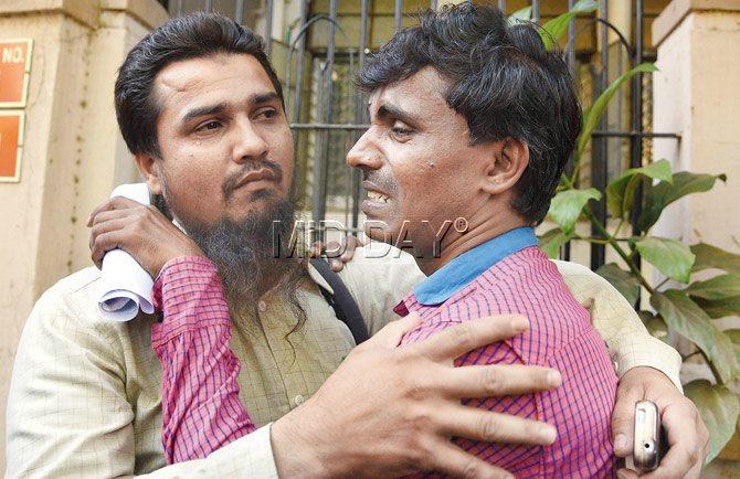 A relieved Noorul Huda (left) and the brother of Shaikh Mohammed Ali Alam Shaikh, another accused, break down after being discharged in the Malegaon blasts case. Pic/Suresh KK