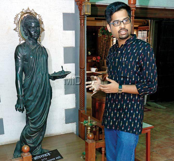 Sandeep Dahisarkar with a replica of Mhatre’s most famous work, 