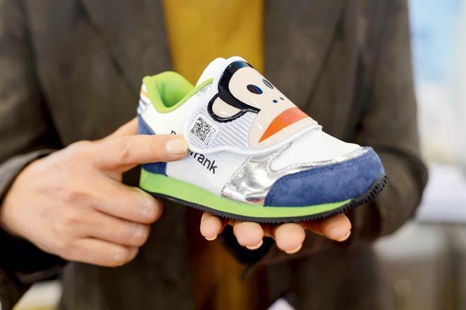 A shoe invented by South Korean inventor Lee Ae Youn, in which a simple QR codes printed on the shoe that carries information, details and contact of a lost child