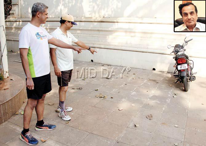 Vikram Mulay (l) and Rahul Gupte (r) point to the spot of the borewell (inset) Shashi Prabhu