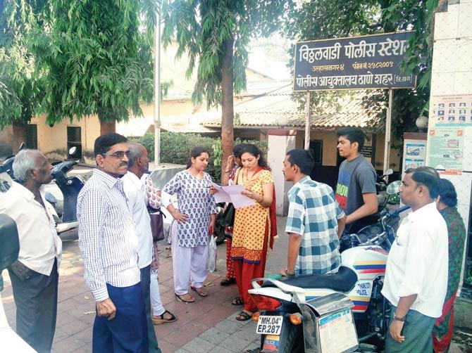 Complainants outside Vithalwadi police station. Pic/Navneet Barhate