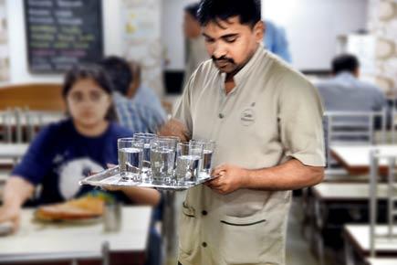 Mumbai eateries using half-filled water glasses, tissues to beat drought