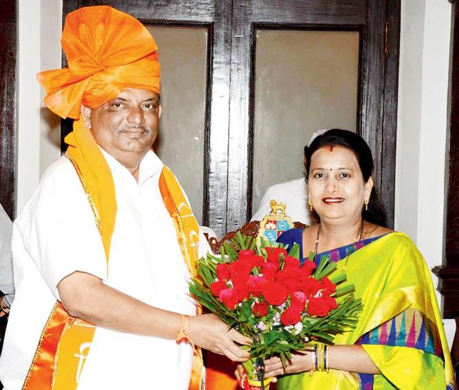 Yashodhar Phanse is greeted by Mayor Snehal Ambekar after he was elected chairman of the standing committee