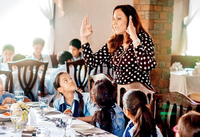 Zohra Chitalwala at a dining etiquette workshop for kids